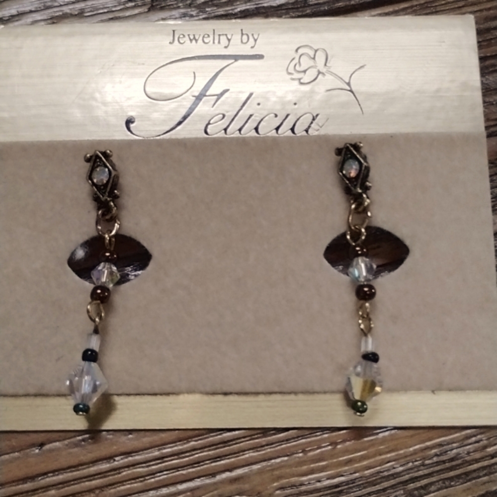Earrings by Felicia never worn crystal stones